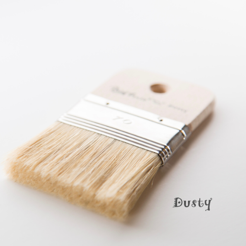 dusty paint brush with white background